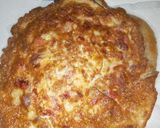 A picture of step 2 of Wrap n roll(chapati and omelette).