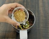 A picture of step 2 of Herbal Chai Masala.