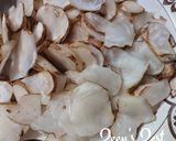 A picture of step 1 of Jerusalem Artichokes Garlic Roast.