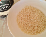 Foto del paso 8 de la receta: Risotto nero con vongole e telline con parmigiano e mela aioli