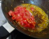 A picture of step 3 of Chingri macher malai curry.