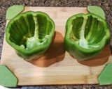 A picture of step 1 of Cheesy Stuffed Green Bell Peppers.