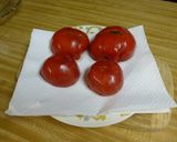 A picture of step 3 of Easy Stuffed Baked Tomatoes.