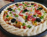 A picture of step 4 of Cheesy Bites Petals Pizza 🍕🍕.