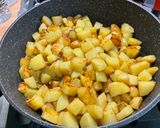 Une image de l'étape 8 de Pommes de terre sautées aux oignons nouveaux.