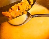A picture of step 2 of Orange pudding with dash of tutti frutti.