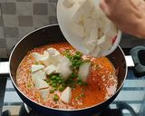 A picture of step 9 of Muttor paneer with laccha paratha.