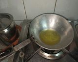 A picture of step 1 of Suji Ka Halwa.