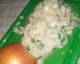 Foto del paso 2 de la receta: Zapallitos rellenos con arroz y carne picada
