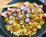 Une image de l'étape 9 de Pâtes d’Alsace aux légumes sautés, saucisses et emmental.