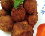 A picture of step 11 of Stuffed cheesy mushroom balls.