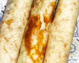 A picture of step 15 of Chicken Frankie Roll.