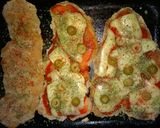 Foto del paso 3 de la receta: Milanesas congeladas a la napolitana (todo al horno..)