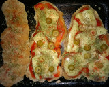 Foto del paso 3 de la receta: Milanesas congeladas a la napolitana (todo al horno..)