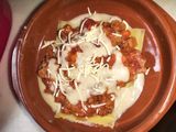 Lasaña al horno de leña