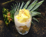 Foto del paso 2 de la receta: Postre individual de piña con yogur, miel y crocante de almendra