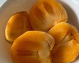 A picture of step 1 of Sharon fruit and mango halwa.