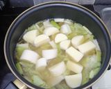 Foto langkah ke 3 dari resep Sup Miso Egg Tofu, Enoki dan Sawi Putih.