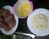 Hình bước làm 3 của món Trứng bắc thảo bọc thịt chiên xù
