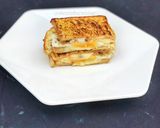 A picture of step 4 of Cheesy egg toast.