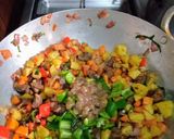 A picture of step 3 of Stir fried potatoes with veggies and gizzard.