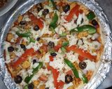 A picture of step 4 of Smoked chicken tikka flavour pizza 🍕🍕🍕🍕😋😋😋😋.