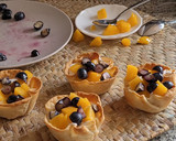 Foto del paso 10 de la receta: Tartaletas con yogur, melocotón y arándanos