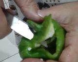 A picture of step 11 of Stuffed capsicums and tomatoes.