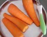 A picture of step 1 of Refreshing Carrot Ginger Juice.