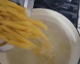 A picture of step 1 of Seafood Rose` penne pasta.