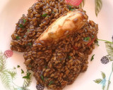 Foto del paso 9 de la receta: Arroz negro con chipirones rellenos