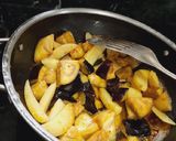 A picture of step 2 of Brinjal potato curry.
