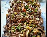 A picture of step 21 of Tahini Chocolate Cake with Coconut Chocolate Mousse frosting.