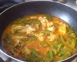 A picture of step 2 of Bhindi chicken.