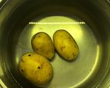 Foto del paso 1 de la receta: Papas explotadas