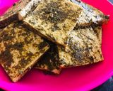 A picture of step 1 of Tofu fry in single garlic with curry leaves powder.
