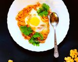 A picture of step 7 of Muhammara Walnut Shakshuka.