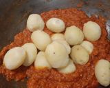 A picture of step 7 of Nepali style Aloo Dum with Chiwda /Poha/ Flattened rice.