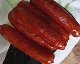 A picture of step 4 of Sumptuos Fried Beef Sausages using very little oil.