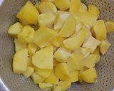 A picture of step 2 of Aloo ka bharta.