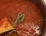 A picture of step 4 of Baked Goat Brie in Spicy Garlic Tomato Sauce.