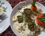A picture of step 13 of Spinach Corn Ravioli in white sauce.
