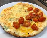 A picture of step 6 of Cheddar, Broccoli and Red Chilli Soufflé Omelette, Garlic roasted Cherry Plum Tomatoes, Olive Oil.