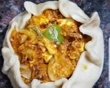 A picture of step 5 of Open samosa with cheese filling.