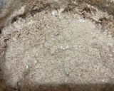 A picture of step 3 of Red raw rice unniyappam.