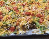 A picture of step 8 of Taco pizza.