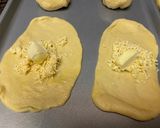 A picture of step 5 of Roti Boy (coffee bun with butter & cheese filling).