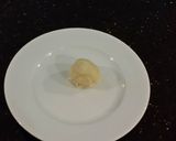 A picture of step 4 of Coconut Cream Thumbprint Shortbread Cookies.