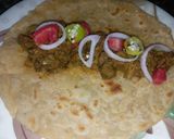 A picture of step 5 of Boti paratha roll.