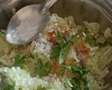 A picture of step 4 of Cucumber,Mint and Lemon grass Koshimbir with Tulsi leaves.